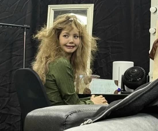 BLACKPINK's Lisa Reveals Her Mischievous Side in Never-Before-Seen Backstage Photos